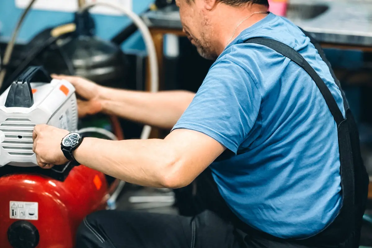 Skilled technician at work in a repair workshop
